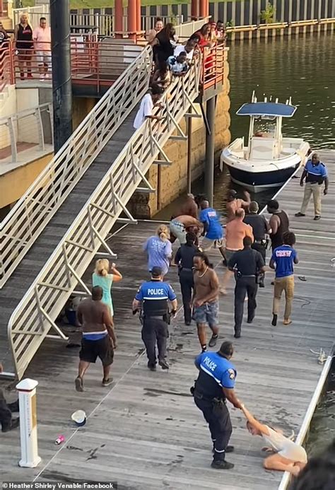 00:50. The man spotted wielding a folding chair as a weapon during the wild WWE-style attack on the black co-captain of a riverboat trying to dock in Alabama turned himself in to police Friday ...